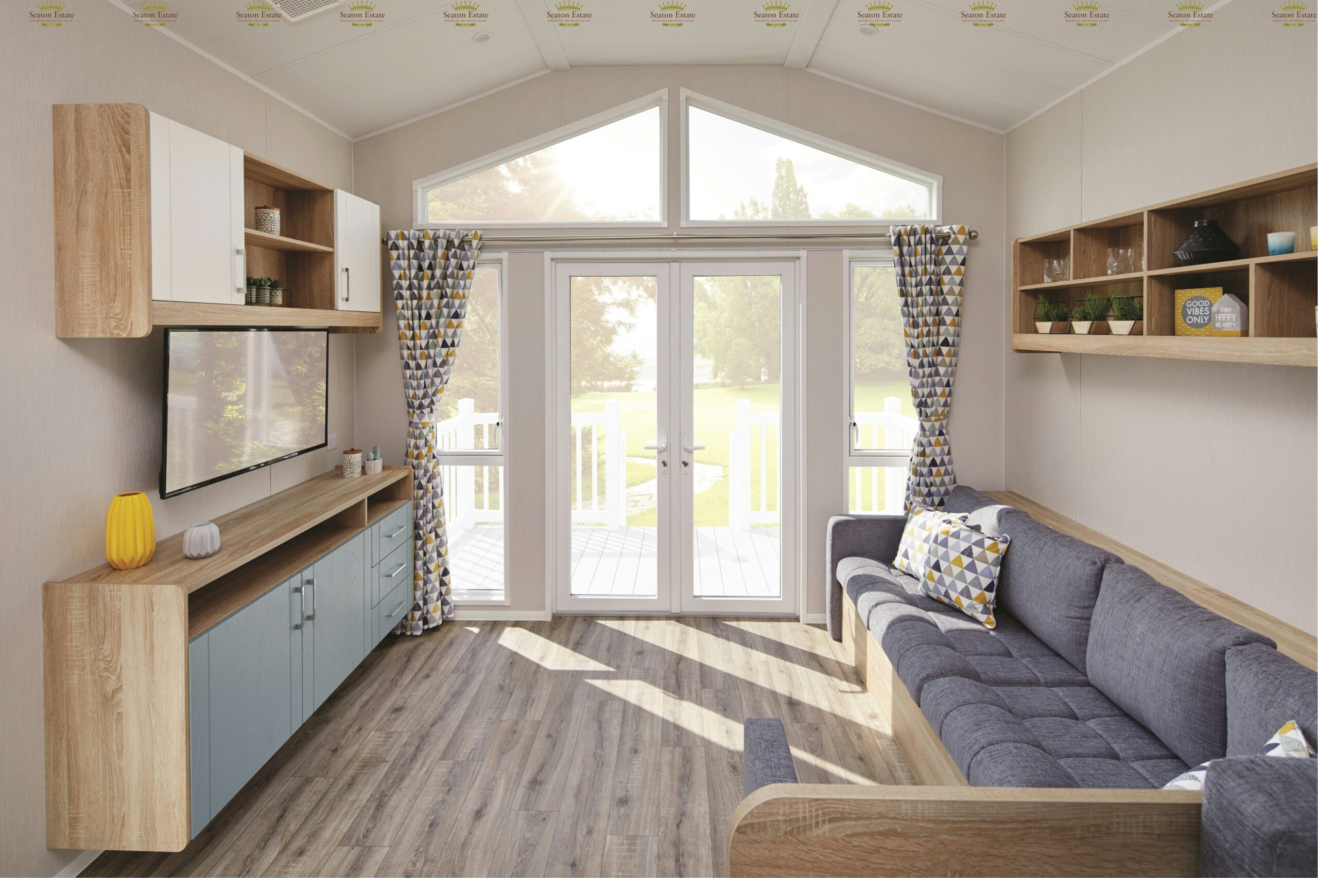 Inside of the living room, featuring white frame window